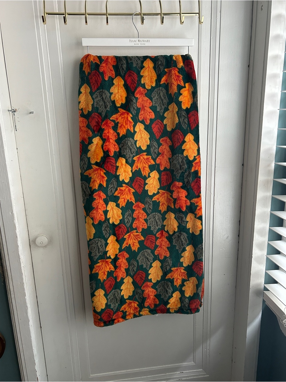 The Big One Green Throw Blanket with Orange, Yellow & Red Leaf Pattern